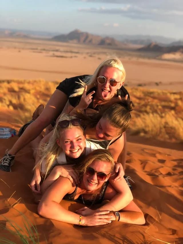 Students enjoying the dunes together