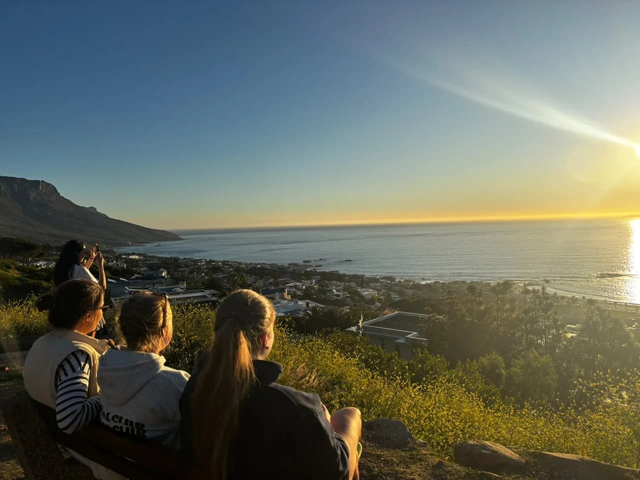 Friends watching the sunset in Cape Town